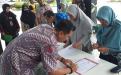KADINSOSPMD, Budi Utama melakukan penandatanganan Perjanjian Kerja Sama